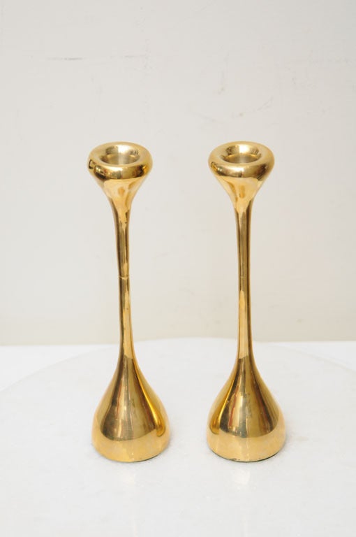 These beautiful little gems of candlesticks shine Elsa Peretti style; elegant, like jewelry.Perfect for anywhere! They have some good weight to them, and unscrew
in the center; very well made, and oh so moderne!

The quality and specialness of