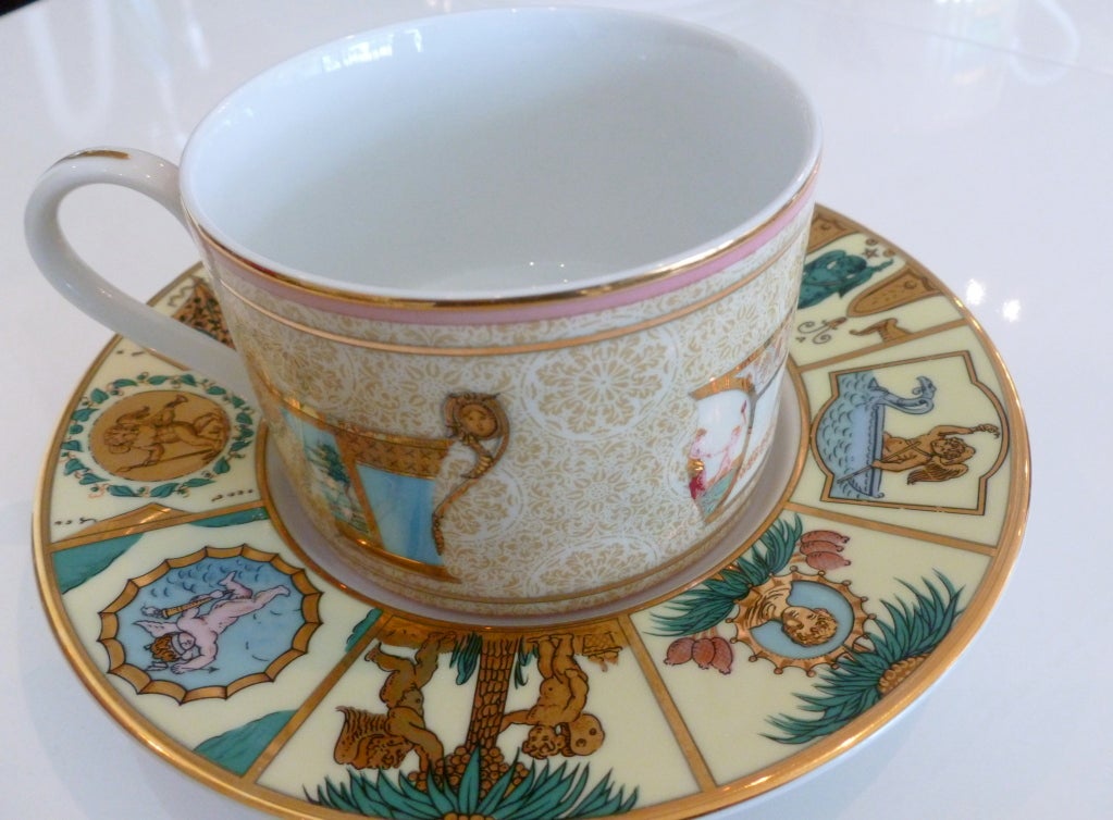 Beautiful, symbolic and perfect is this gold rimmed italian Gucci porcelain service set from italy,
circa 1970's... it is rare... and luscious colors against the greek mythological symbols. The condition is perfect; almost as never used...It is