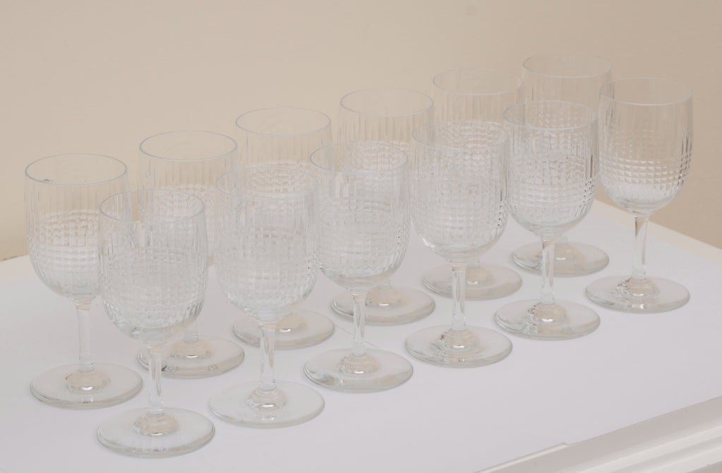 This very old yet modern AND ELEGANT pattern of Baccarat stemware is  called Nancy, is timeless and elegant, with it;s cross cut incisions in the crystal.
it is no longer in existence or production. Even the replacements are rare and expensive.