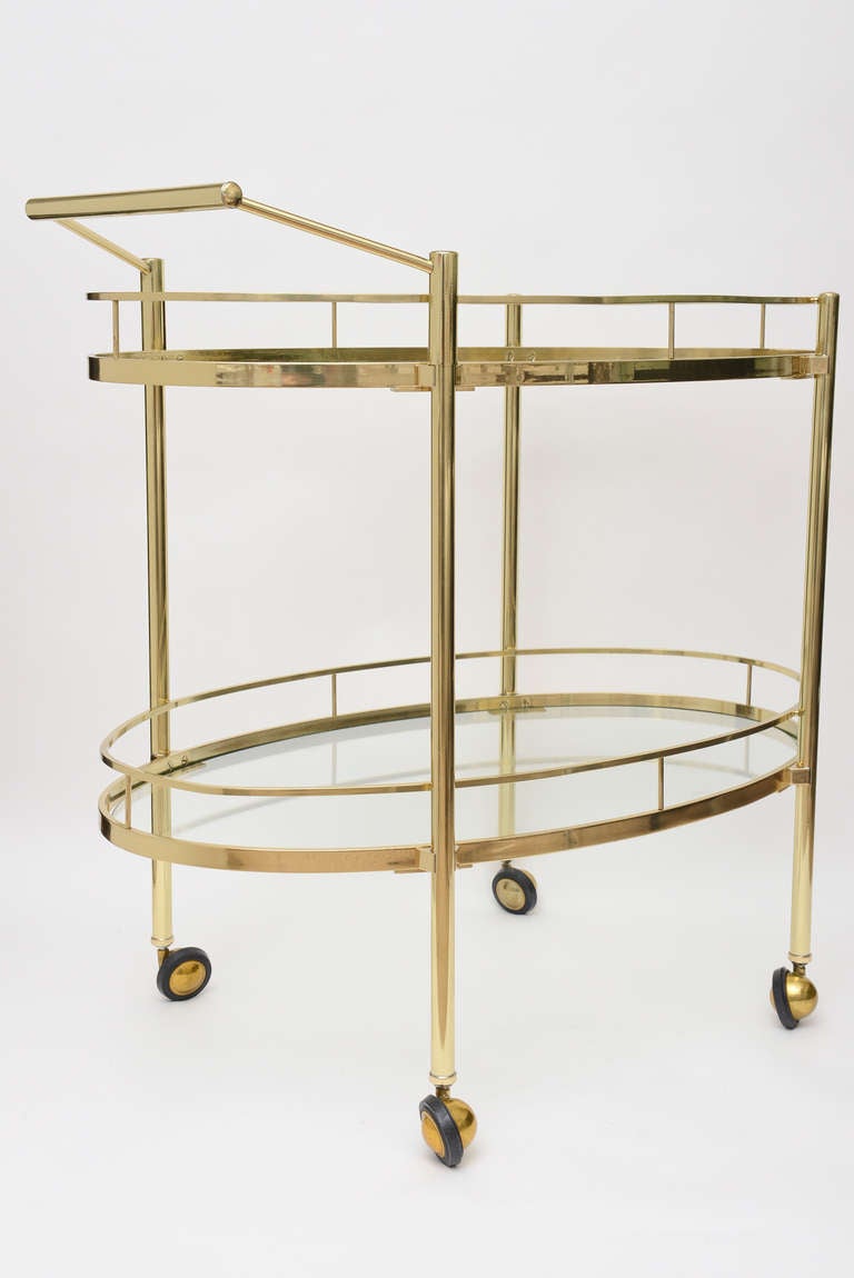 Polished TwoTiered Brass and Glass Oval Bar and Serving Cart/ Trolley