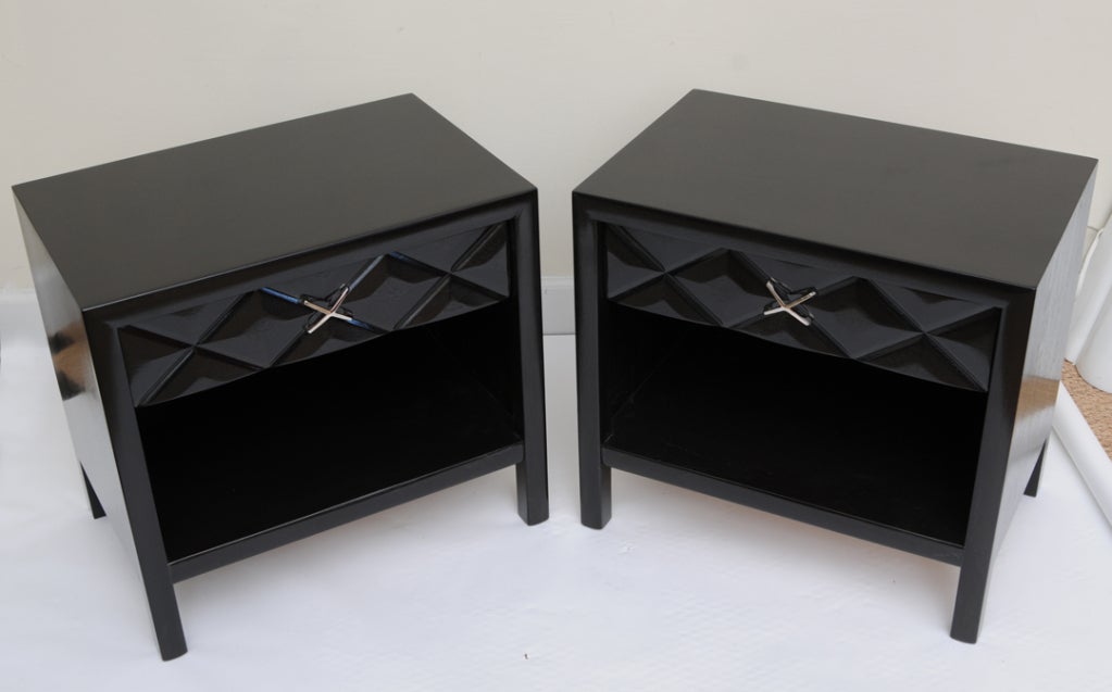 These great newly restored and ebonized midcentury modern John Widdicomb night tables or end tables have the quilted effect diamond pattern drawer fronts with a nickel silver X-pull on each one. They are signed in the drawer with the original labels
