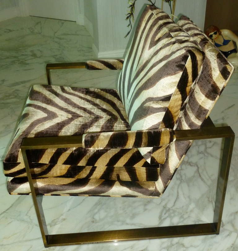 These unusual and stunning pair of lounge/side chairs in the oiled bronze finish by Milo Baughman are rarely seen. They have expensive beautiful silk velvet
zebra upholstery on them; all original....
They are exqiuisite and would add great