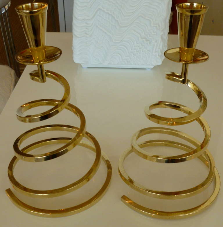 They have spring to them... they have slinkiness to them...they have airiness, they have beauty... GREAT PAIR!!!
they are spiral and have good weight... newly polished solid brass spiral vintage modern candlesticks for any table..

NOTE: THESE