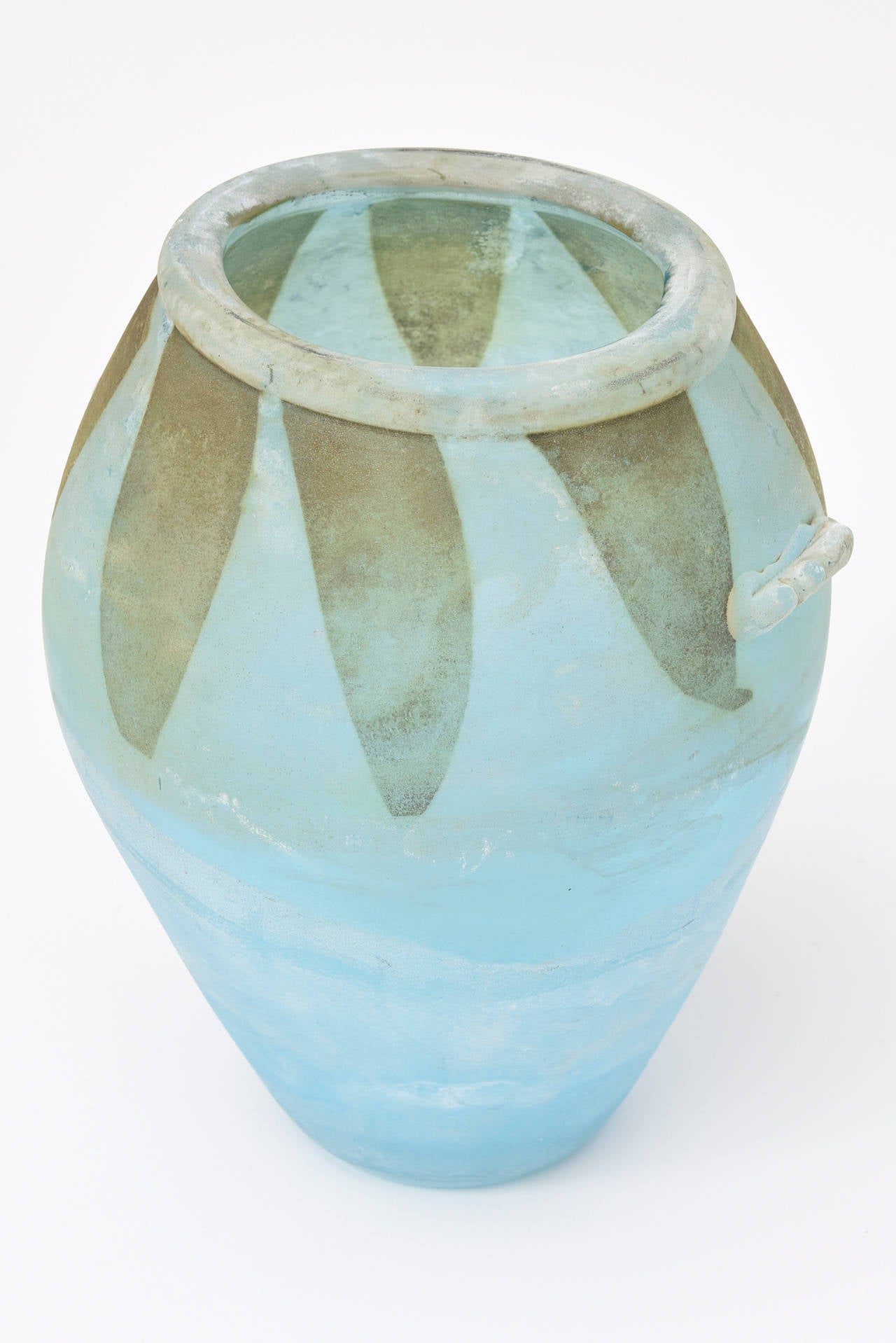 The technique of this blown glass vase/vessel/sculpture is so beautiful. The subtle but rich colors of this signed Seguso Murano work of art in coroso glass looks like it came from a museum in the Mediterranean. it looks like old Roman glass that