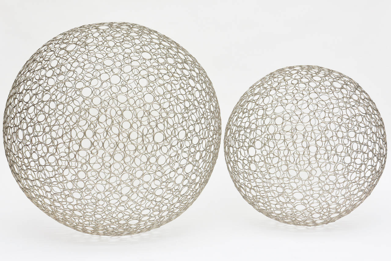 English Pair of Floor Ball Sculptures