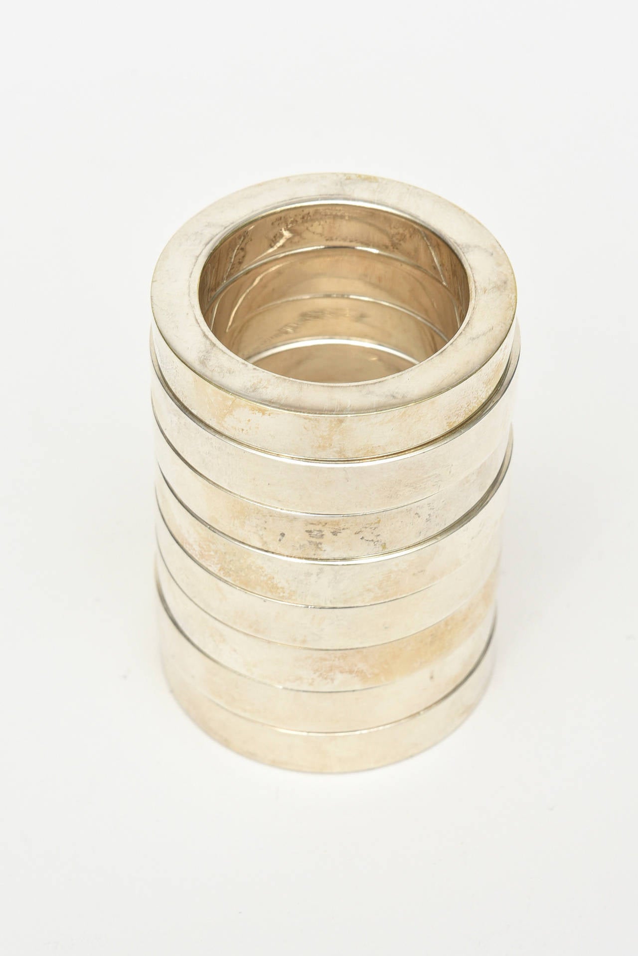 Mid-Century Modern Set of Eight Circular Modernist Vintage Silver-Plate Napkin Rings