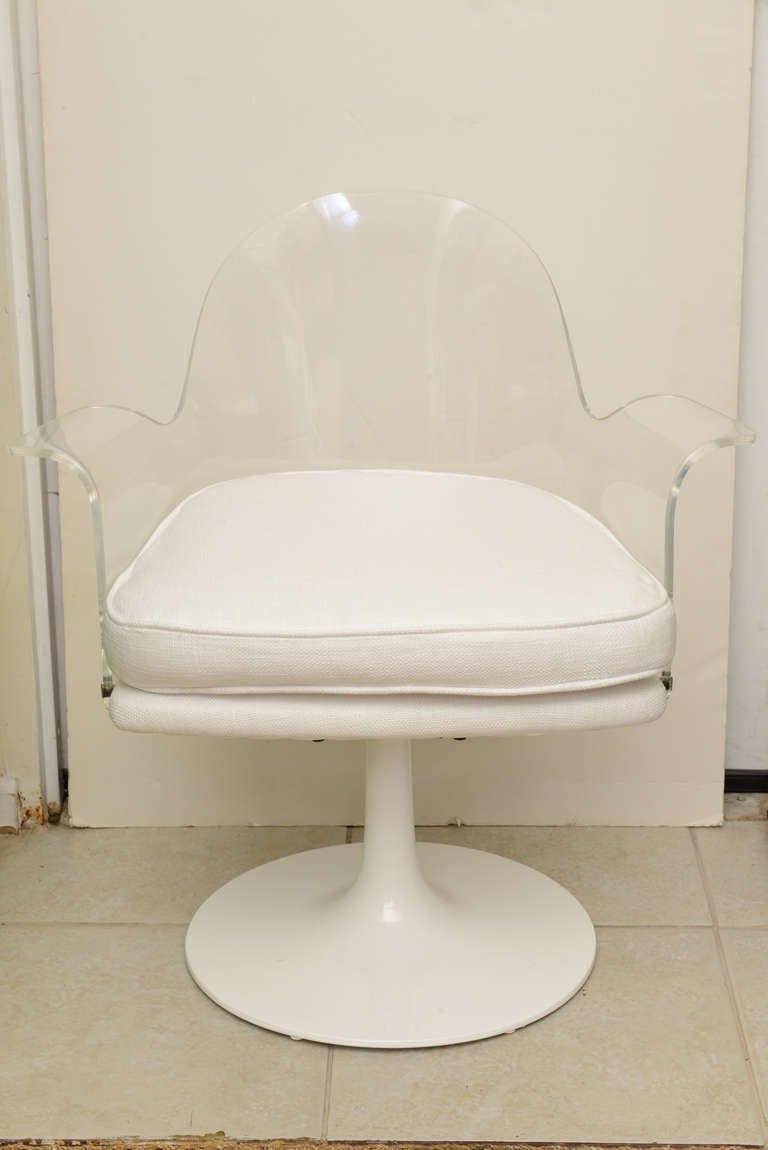 Newly upholstered in white linen weave fabric makes this Vladimir Kagan style desk/vanity/side chair with it's tulip base chair very desirable; the winged arms of lucite give it a ghost like sculptural look ....Nickel Silver hardward along the seat