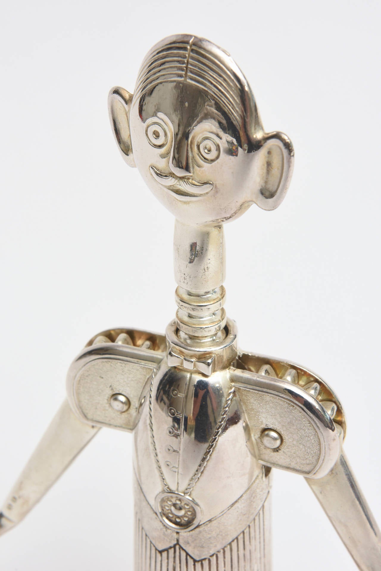 This lovely and vintage Italian wine opener has great weight to it.
It is the image we believe of a sommelier.
It will stand up on it's own on a bar!
Delightful and charming!