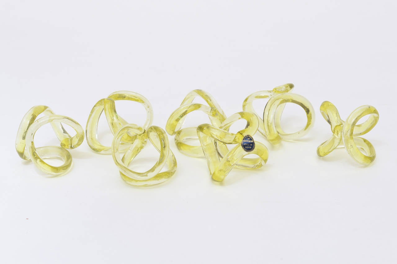 These lovely and luscious colored chartreuse glass Italian Murano glass napkin rings retain one of the original paper labels on one of the rings.They are a set of 7.... will not be able to break up the set.
Great addition to any table setting! and