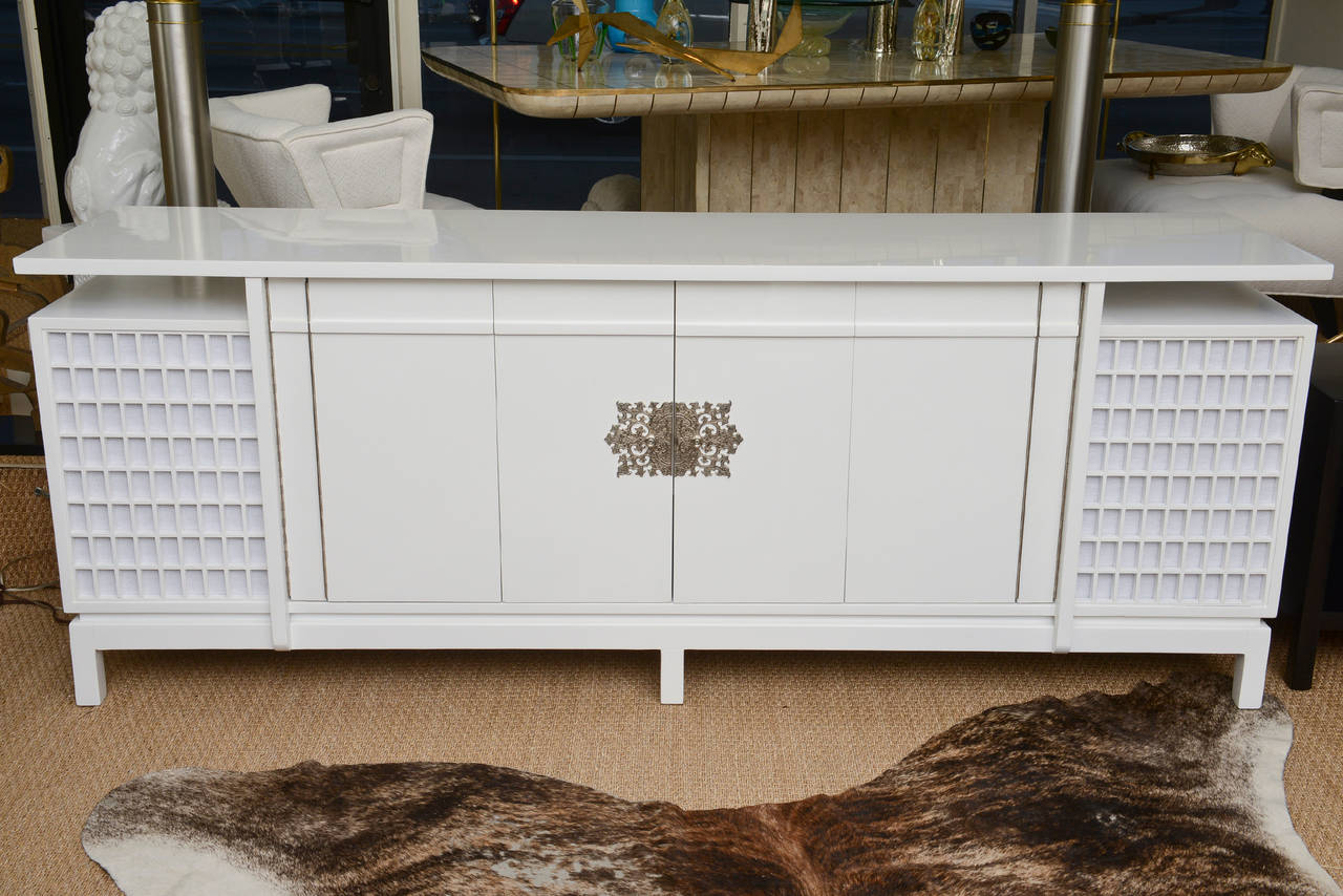 This newly restored original cabinet was an entertainment unit in the 1960s.
The hardware is all original and newly nickeled silver.
 The ends have white screens in them for where the speakers went. It has been newly replace with fresh white