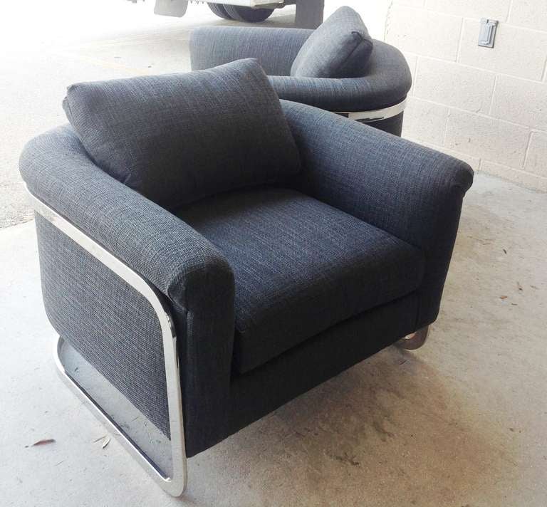 Pair of Lounge Chairs by Milo Baughman with Nickel plated 
Steel frames supporting floating bucket seats in new upholstery.