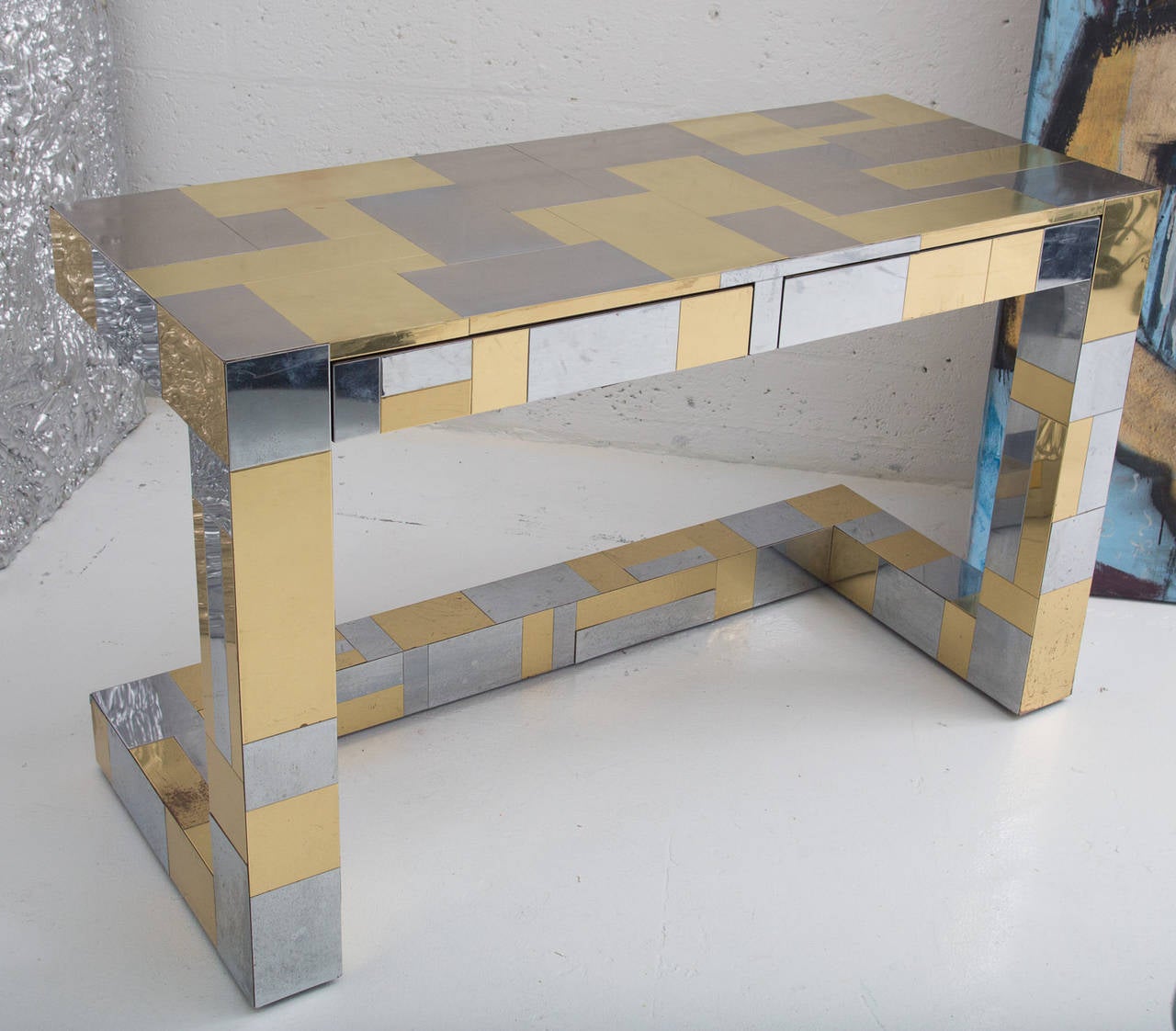 Cityscape desk by Paul Evans for Directional.
Steel and brass veneer, two drawers on cantilevered base.
Vintage conditions with few dings and scratches.
Signed.