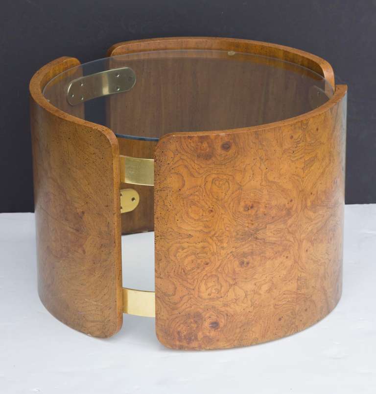 Pair of Open Drum Side Tables with olive burl-wood 
wrapped round supports connected with
solid brass tabs at the top and bottom.
Thick clear glass tops inserted inside.
On display at ENTREPOT,Miami.
By appointment only.