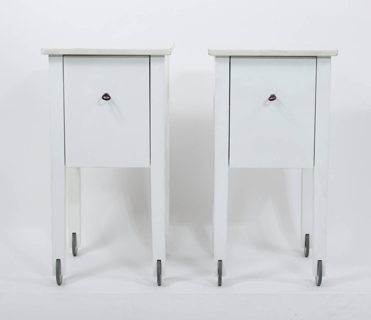 Pair of nightstands designed by Philippe Starck,
for Ian Schrager's Delano Hotel,
featuring Carrara marble tops,
Dimensions: 12.75
