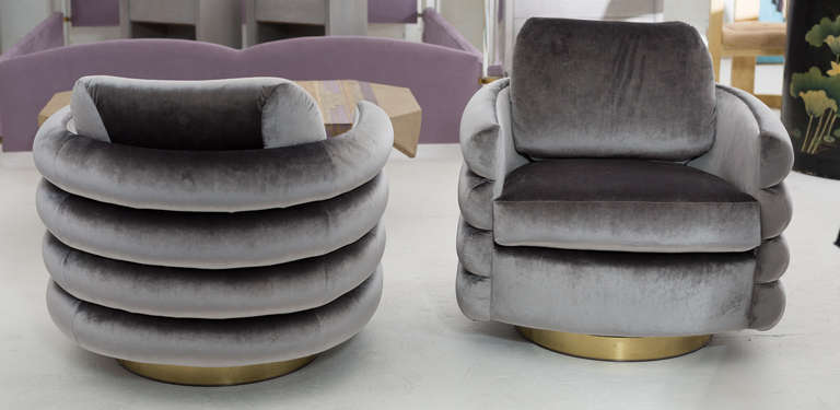Pair of Lounge Chairs by Milo Baughman
with swivel and rocking brass wrapped base.
Newly upholstered in Silk  velvet.