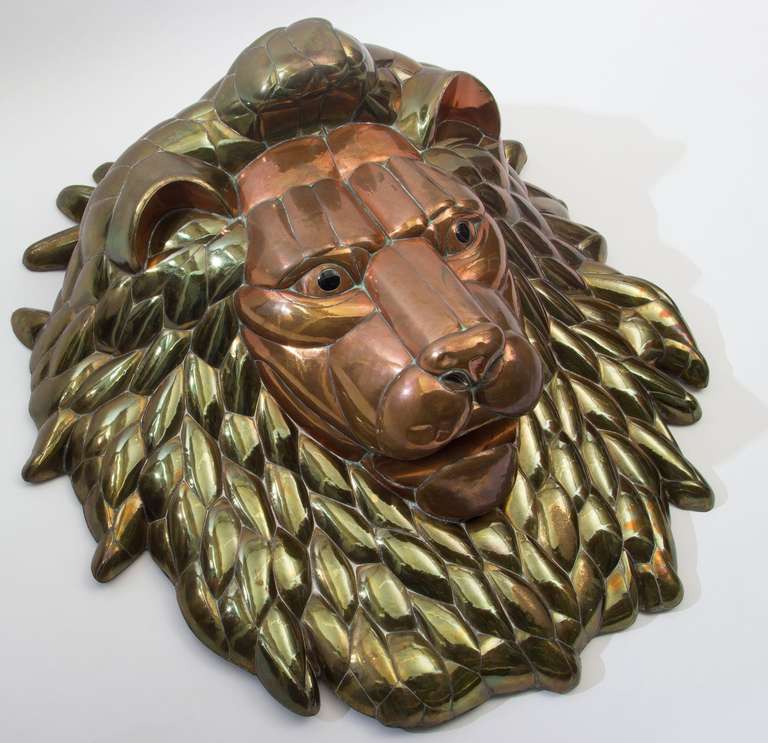 Wall Sculpture depicting King of the Jungle 
by Sergio Bustamante executed in his signature materials,
Copper, brass and sheet metal at the back.
