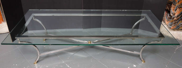 Steel and Brass Coffee Table in Maison Jansen style
with thick glass top 28