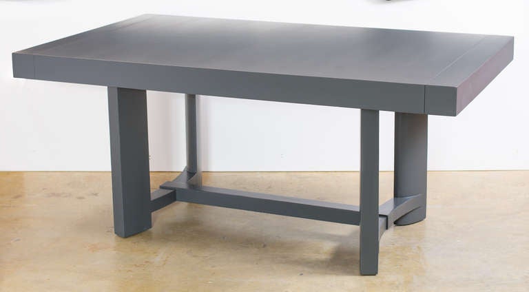Dining table by T.J. Robsjohn-Gibbings for Widdicomb.
Refinished in dark grey matte lacquer.
With two matching 14" wide extension leaves.
Stamped and labelled Widdicomb.