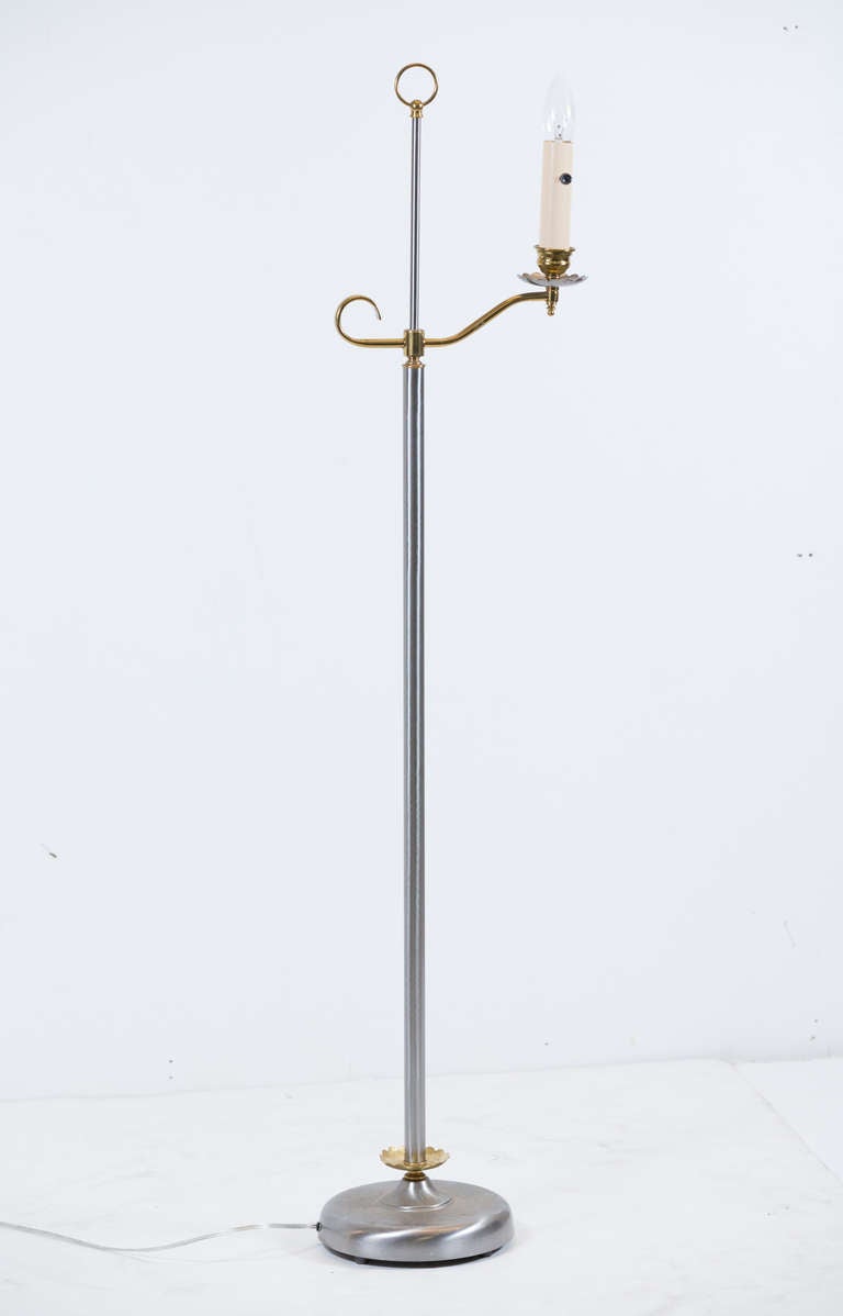 Steel and brass table lamp in Maison Jansen style.
With brass single candelabra mounted on a steel.
Stem and steel base.
Recently rewired.