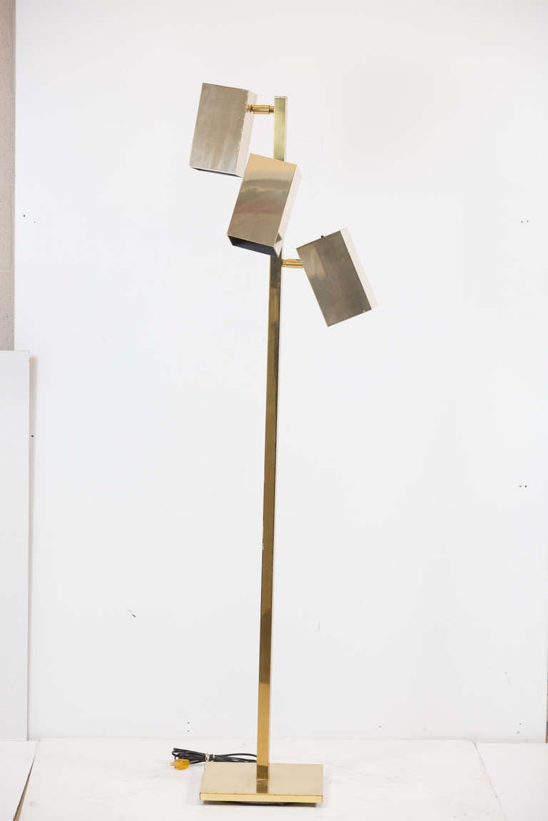 1970s brass floor lamp by Robert Sonneman.
Featuring three adjustable square reflectors mounted.
On a square brass post with a square base.