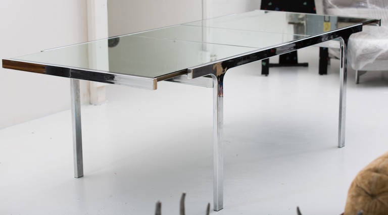 Mirrored glass and steel Dining Room Table
by Pierre Cardin with 20"w 
built in matching Mirror panel, 
extending it to 93", as shown.
Signature @ side frame.