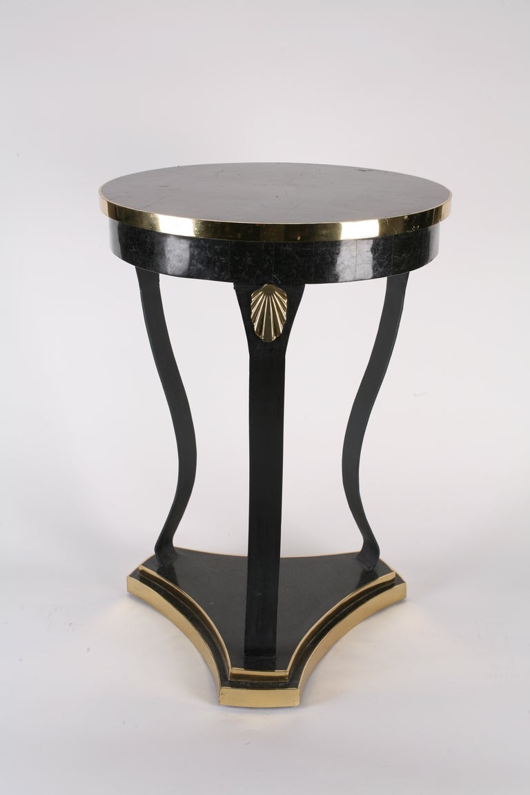Neoclassic style and inlaid brass.  Delicate and excellent scale.

This item is currently in our MIAMI facility. Please call or email us directly for details.
