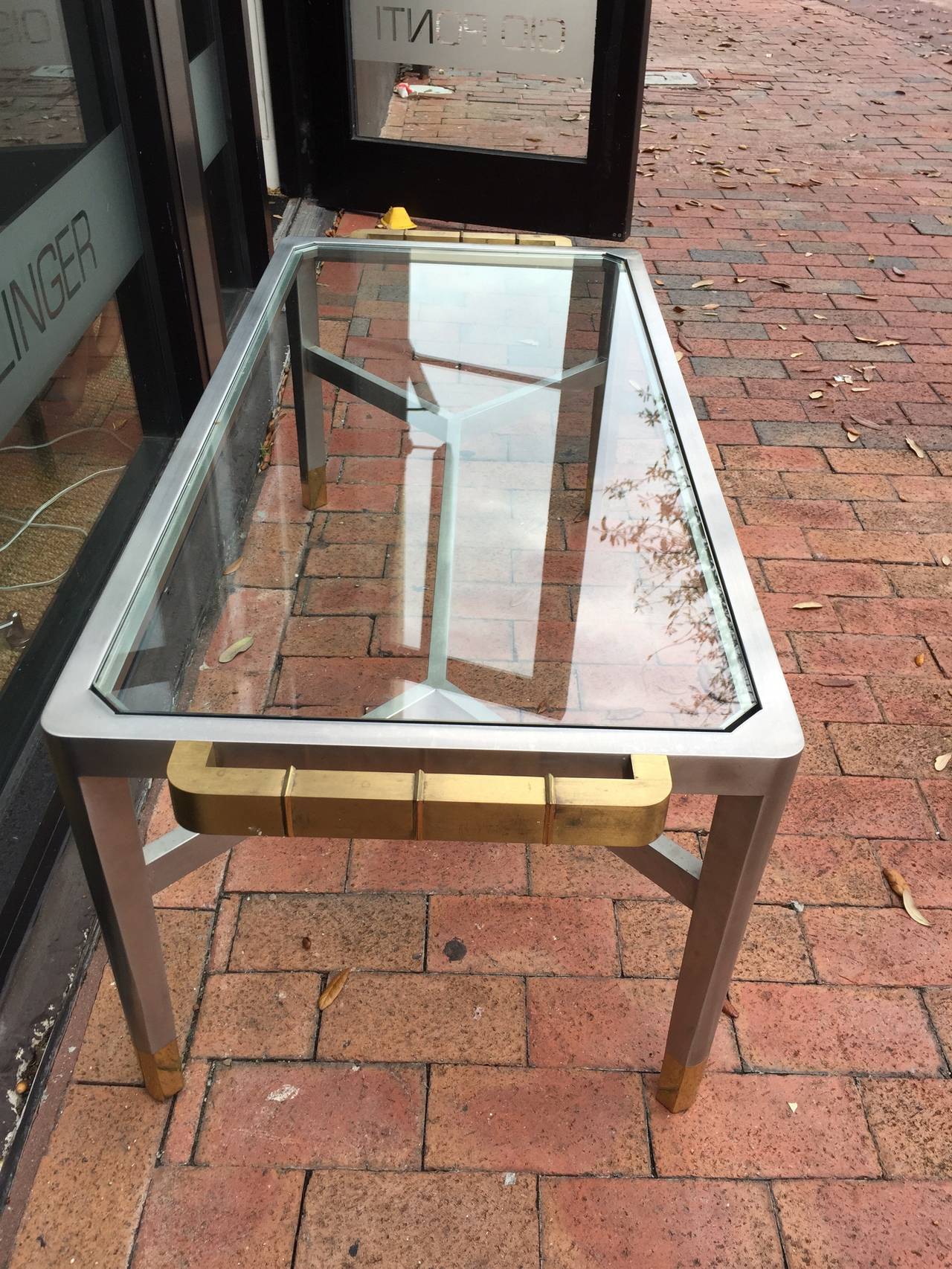 Exceptional Jansen Brushed Steel and Brass Cocktail Table (signed) In Good Condition For Sale In East Hampton, NY