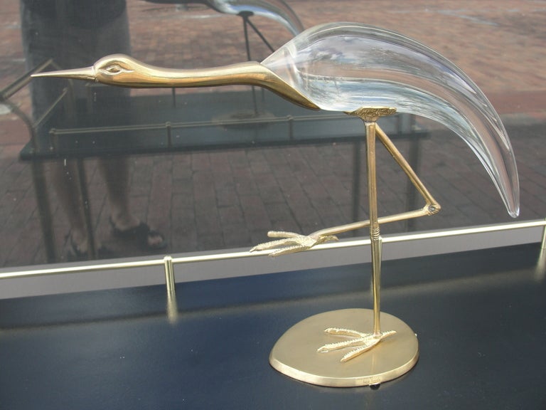 Labeled to base, this beautiful and elegant design of a balancing Crane in brass and glass - Made in Italy