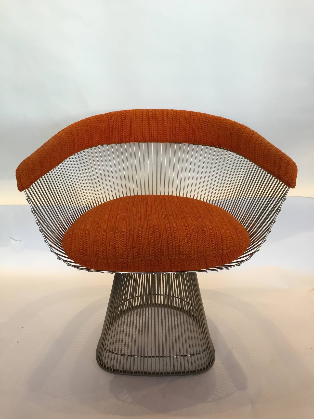 A single nickel framed side chair in original orange wool fabric (great original condition). Designed by Warren Platner for Knoll.