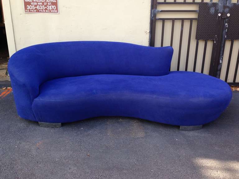 Wonderful original sofa in free form design.

Great blue/indigo color - sold as is - minor repaired rip (shown in photo). Expert re-upholstery available @ add cost (provide your own fabric).

We do have another identical  Kagan cloud sofa ,