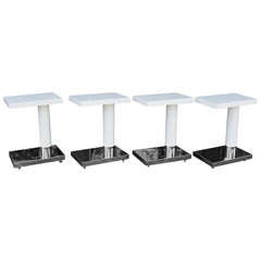 Modernist Polished Steel and Lacquer Occasional Tables on Casters