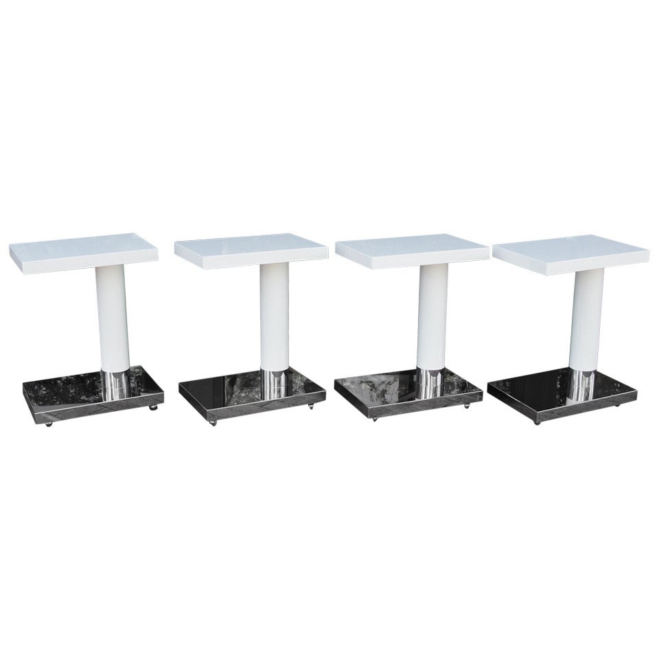 Modernist Polished Steel and Lacquer Occasional Tables on Casters For Sale