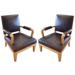 Pair of Armchairs by Jacques Adnet