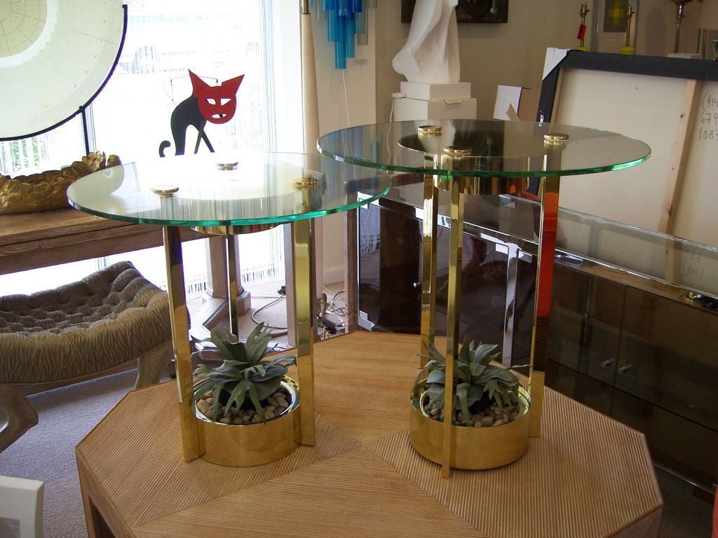 Rare pair of illuminated side tables, great for any space, from Classic to retro. Plants shown are just for display. Original green glass tops in great condition. Rewired with silk cables and polished to their original beauty. Note one table is