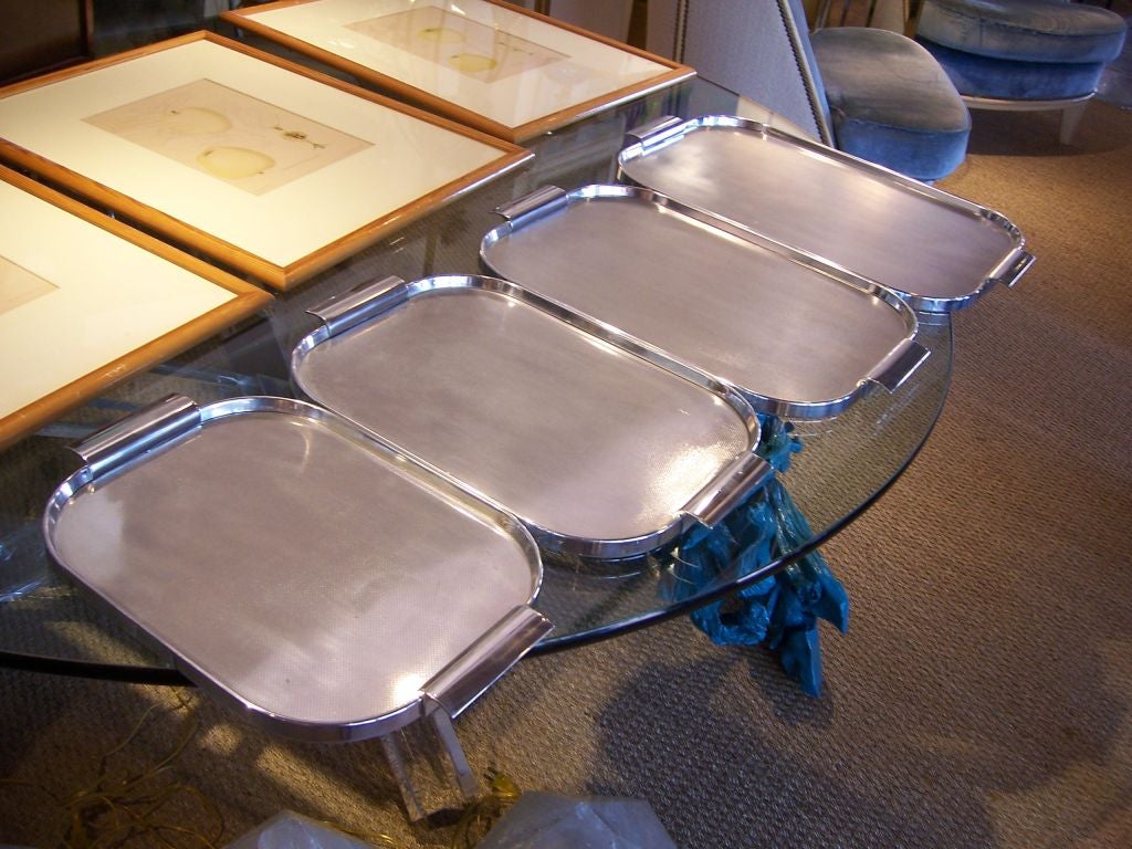 This deco-style / Machine Era Polished Aluminum Trays are perfect for any sized serving.  Made by Kaymet, England<br />
<br />
NEW SHOWROOM NOW OPEN ON SOUTH BEACH (1627 JEFFERSON AVE, OFF OF LINCOLN RD, VAN DYKE SHOPS).<br />
<br />
Extra