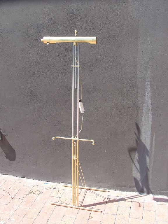 Fully adjustable, this extremely heavy and well made easel with art light features polished brass and chromed tones.  Great for displaying that special piece of art.<br />
<br />
NEW SHOWROOM NOW OPEN ON SOUTH BEACH (1627 JEFFERSON AVE, OFF OF