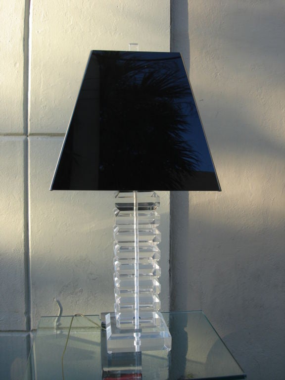 This thick bevelled stacks of lucite are amazingly well preserved.  The black lucite shade is included in the price.