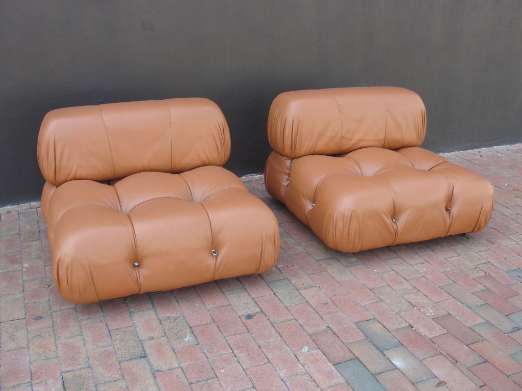 Extremely rare vintage Mario Bellini Camaleonda lounge chairs manufactured by B&B Italia (labels on underside).  Leather (tan colored) on these chairs are in great vintage condition.