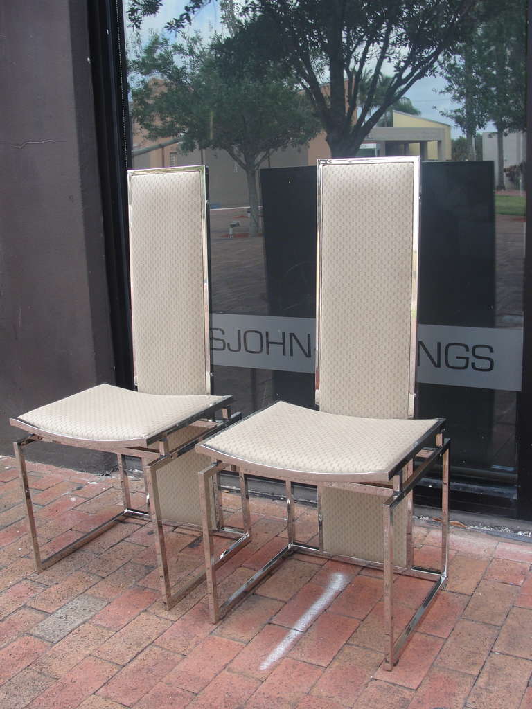 Attributed to Romeo Rega, these geometrically squared and linear chrome chairs are reupholstered in Gucci fabric.