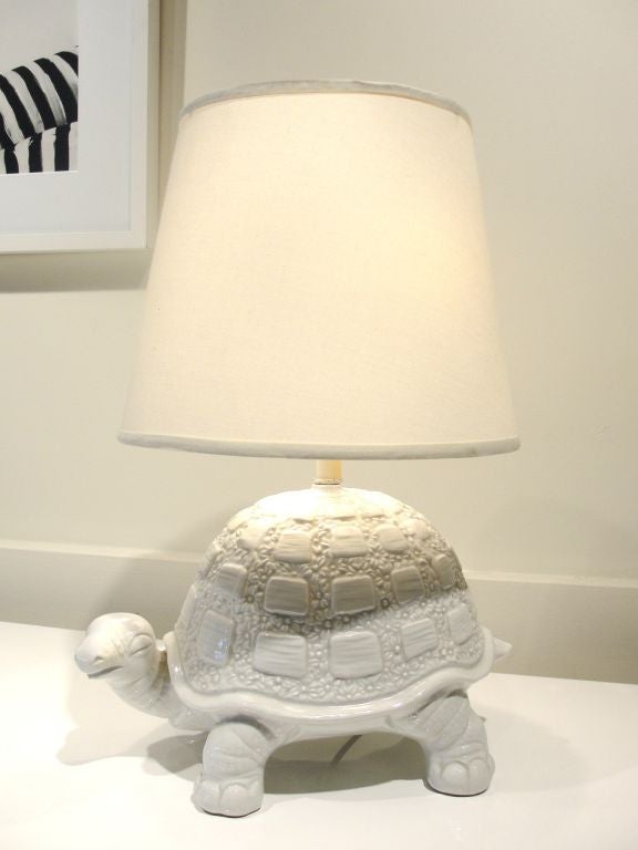 Fun and Functional, this White ceramic Turtle lamp will make a great addition to your decor.