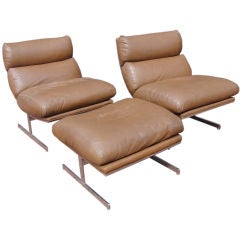 A Pair of Kipp Stewart Heavy Steel Chairs & Ottoman