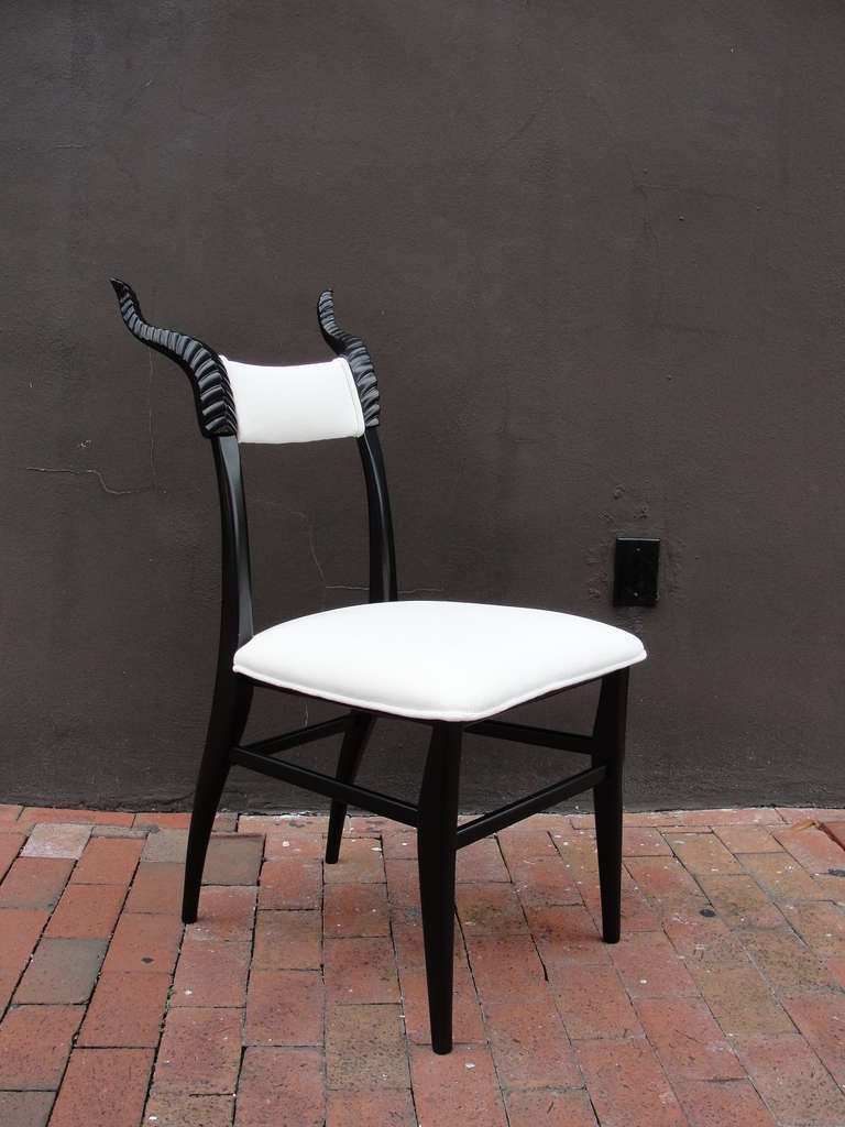 Animalistic decorative and very masculine This is a great dining chair set that is in lacquered black and white soft cotton velvet 
fabric.

This item is currently in our MIAMI facility. Please call or email us directly for details.