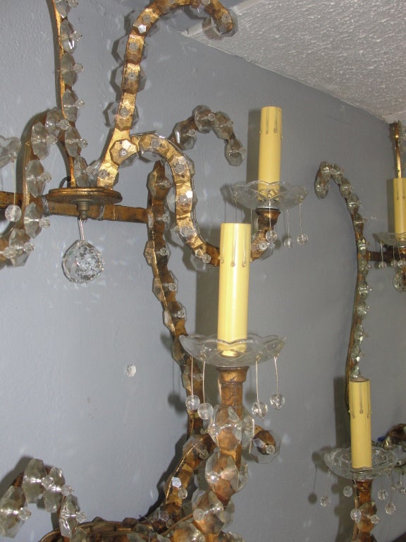 Hollywood Regency Jansen Pair of Oversized Gilt Iron and Crystal Sconces/ Wall Lights For Sale