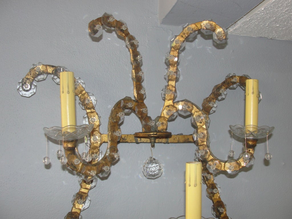 Jansen Pair of Oversized Gilt Iron and Crystal Sconces/ Wall Lights In Good Condition For Sale In East Hampton, NY