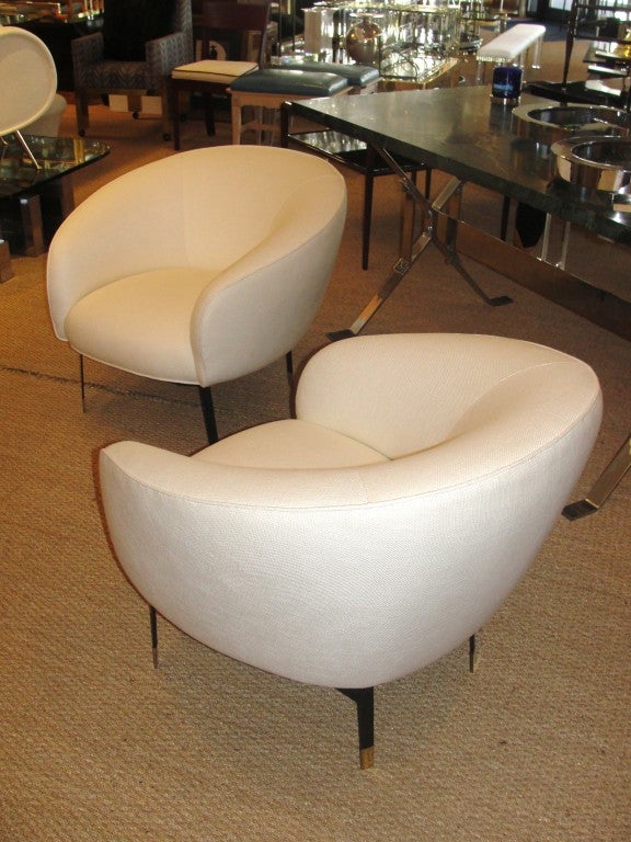 Nicely upholstered in off White Belgian linen. Flat metal legs with brass sabots.  Stunning and very comfortable!

THIS ITEM IS NOW LOCATED IN OUR MANHATTAN SHOWROOM:  
200 LEXINGTON AVE - 10TH FLOOR, NYC.