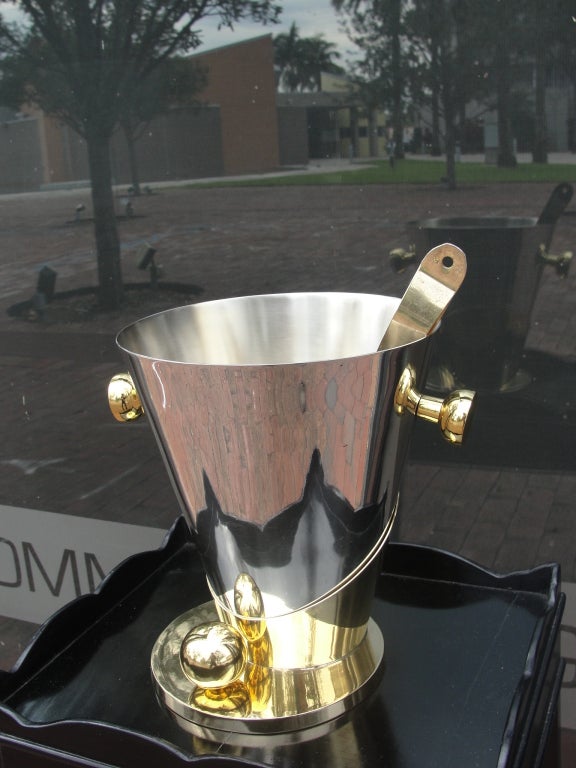 Two pieces, the base in Deco style holds the large vessel for chilling your favorite champagne or wine. Cheers!