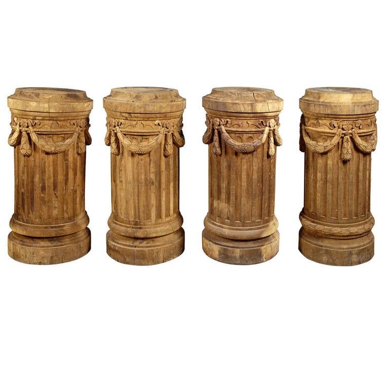 A Set of Four Antique Oak Column Pedestals from France