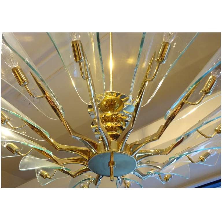 Mid-Century Modern Pair of 12 Light Mid-Century Chandeliers Attributed to Stilnovo circa 1960 For Sale