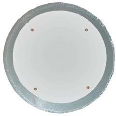 A Round Crystal Framed Wall Mirror by Fontana Arte