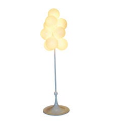A Multi Light Floor Lamp in Lacquer and Glass